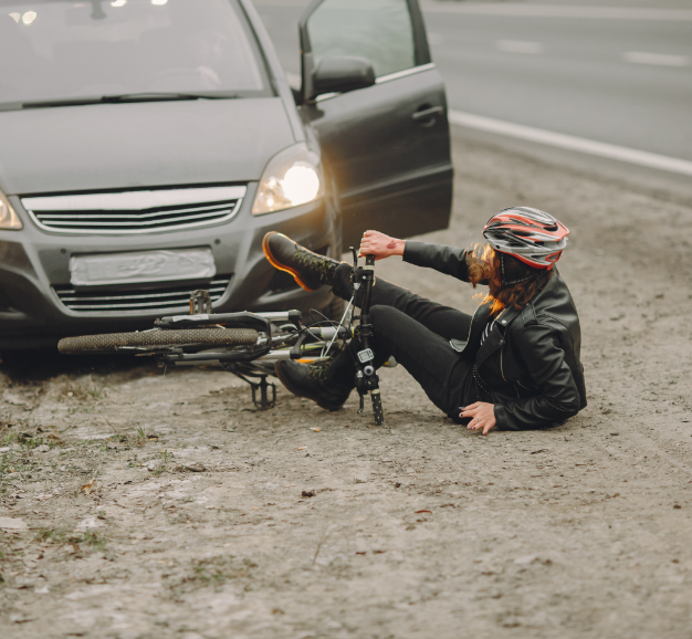 Cyclist Knocked down by Car