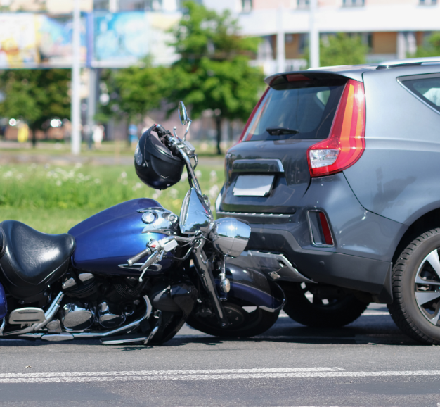 Traffic Accident Between Motorcycle and Car